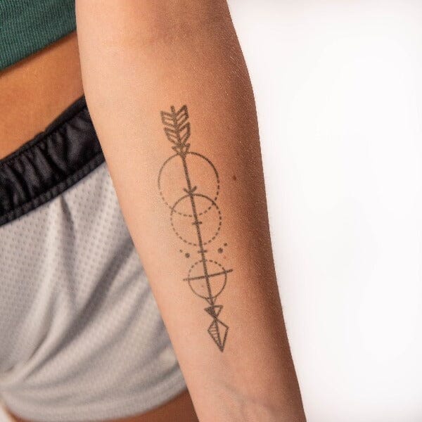 geometric arrow tattoo