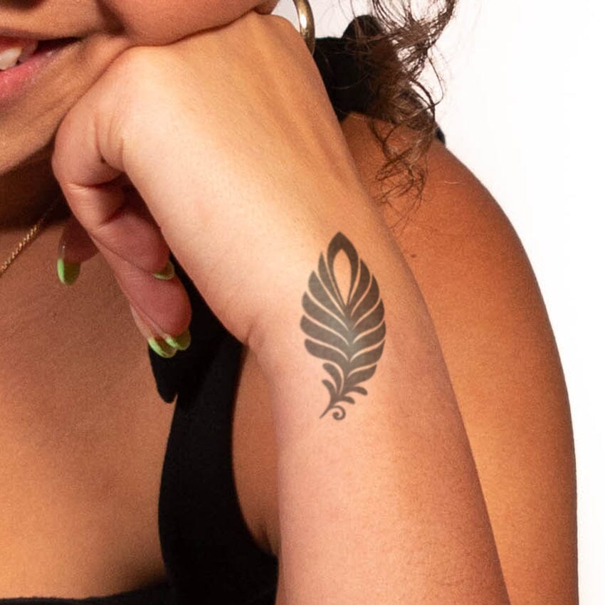 simple peacock feather tattoo